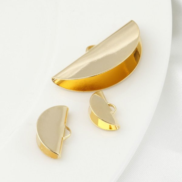 1 vergulde halve maan zetting 35 x 18 mm