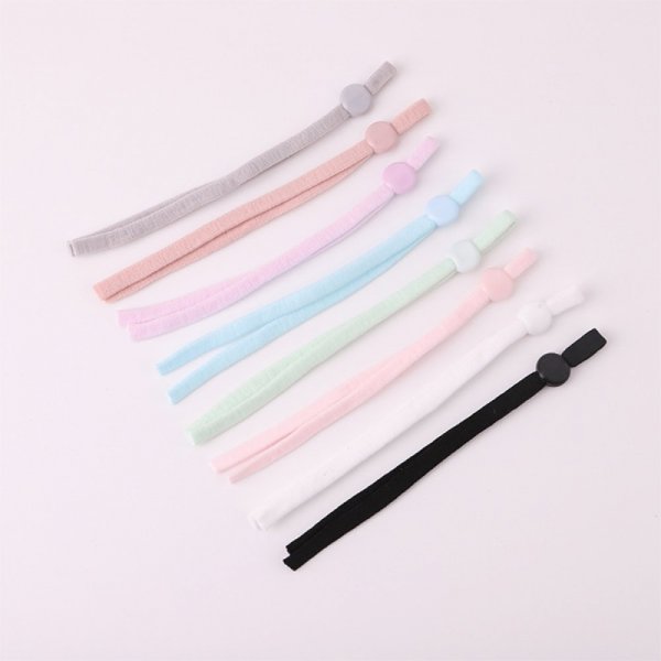 2 witte elastische koordbanden met verstelbare maskerbevestigingslus.