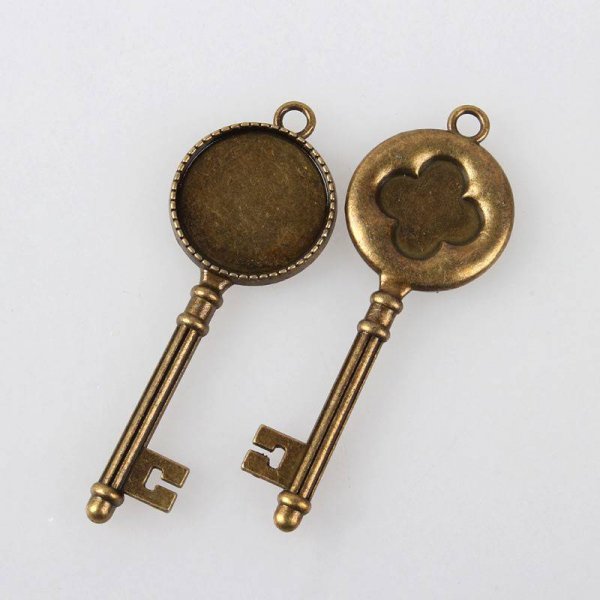 2 x 20mm bronzen cabochonhouders, cabochonhangers 132AB 