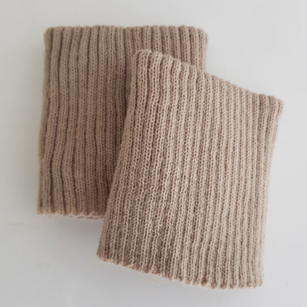 Geribde manchetten of broekspijpen Beige