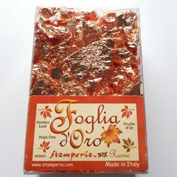 Gouden bladeren in stampedia vlokken