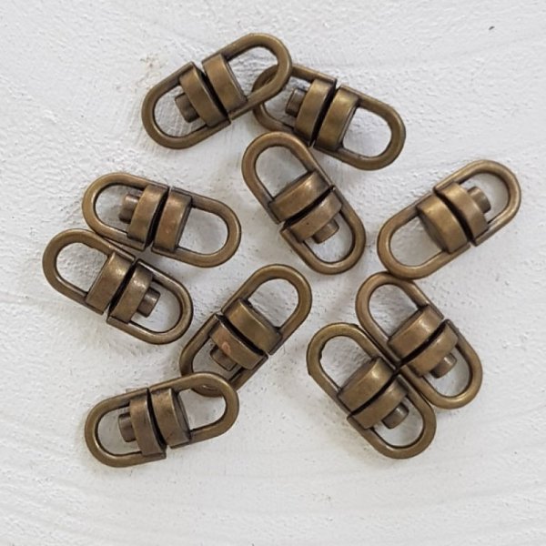 Roterende sleutelhangers Brons