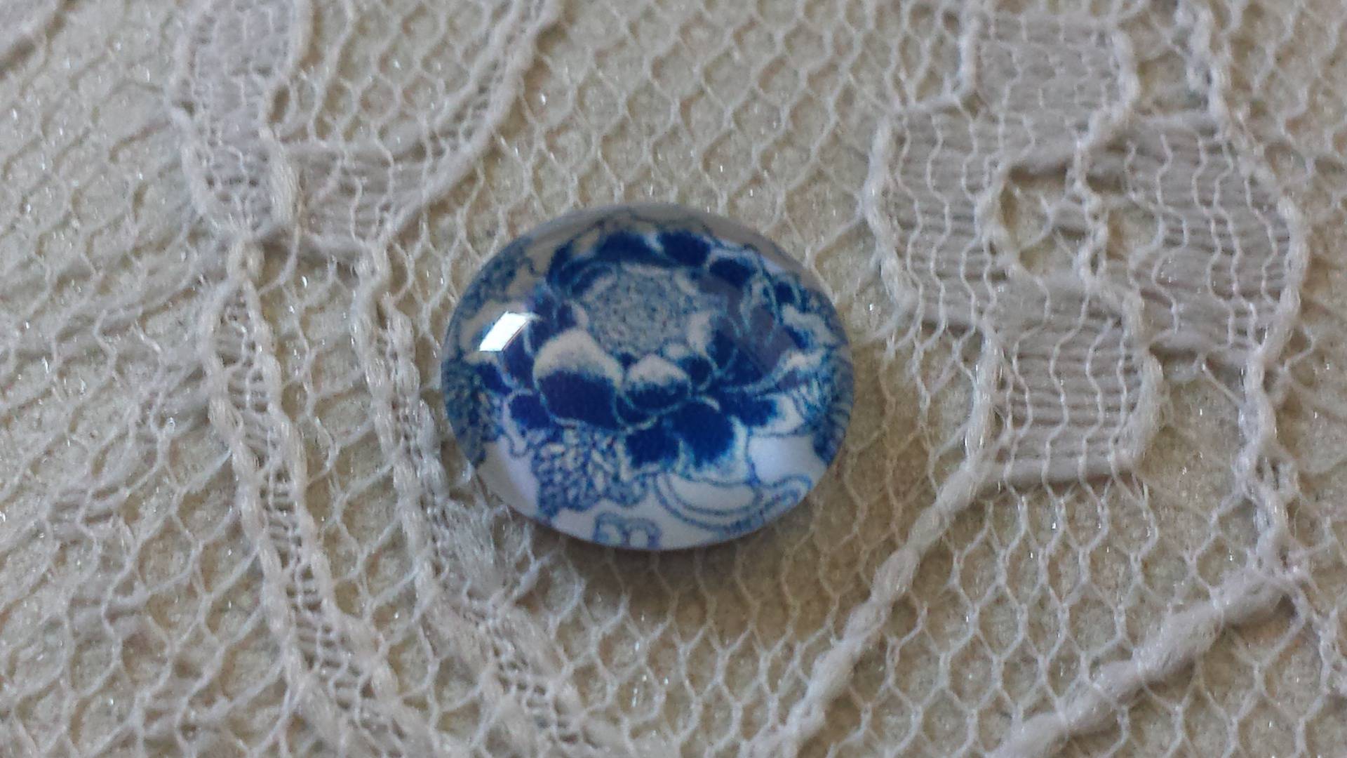 glas cabochon rond 12mm blauwe bloem 034 