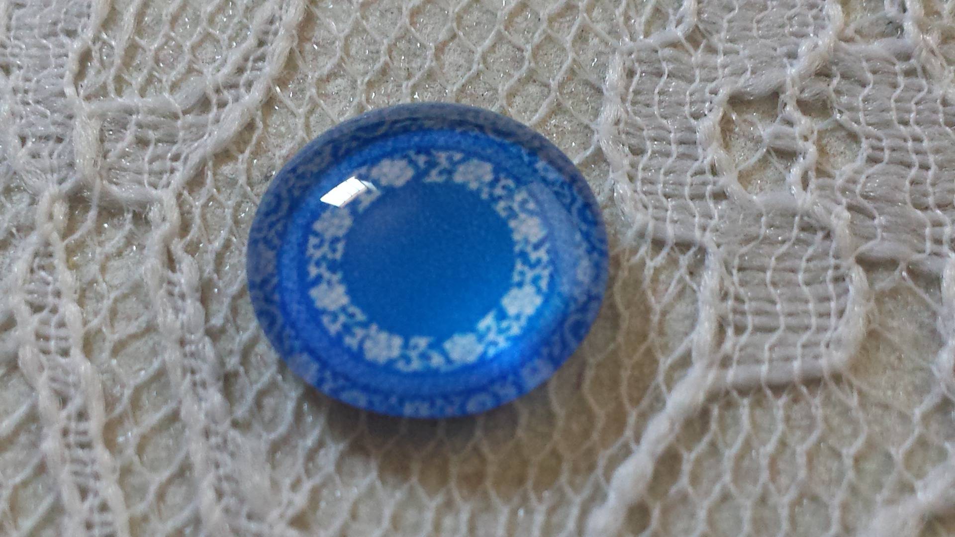 glas cabochon rond 12mm blauwe bloem 027 