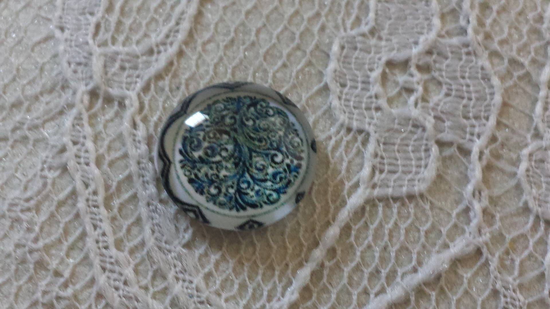 glas cabochon rond 12mm blauwe bloem 025 