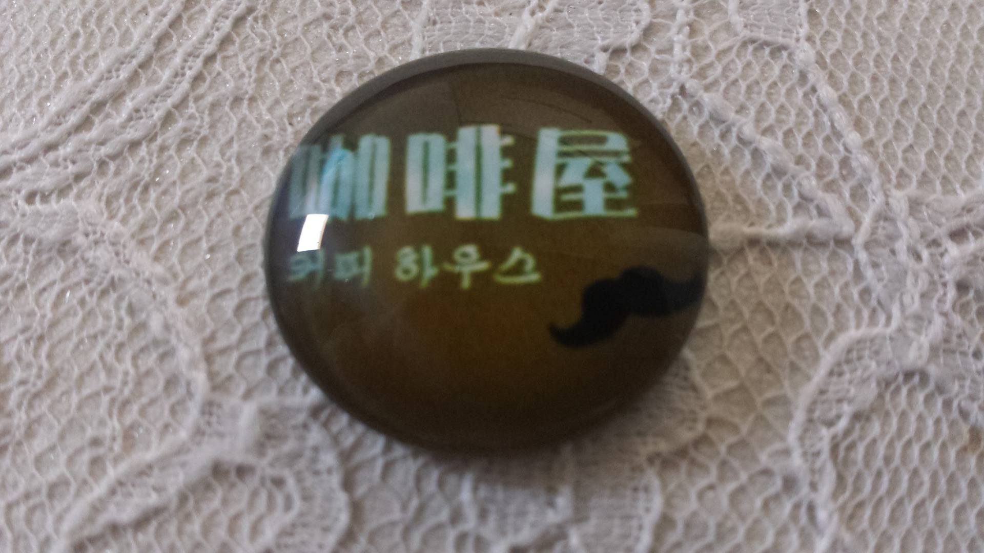 glazen cabochon rond 25mm snor 042 