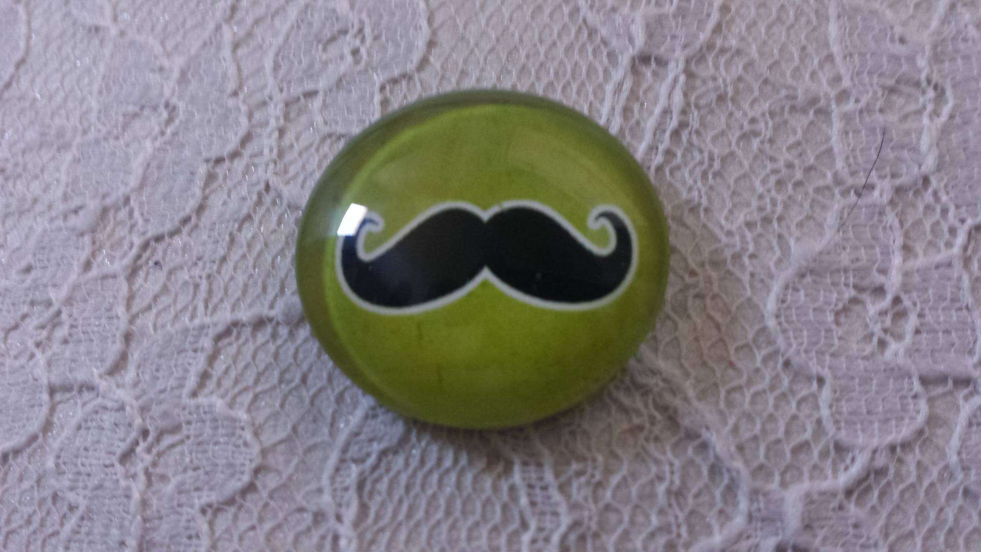glazen cabochon rond 25mm snor 034 