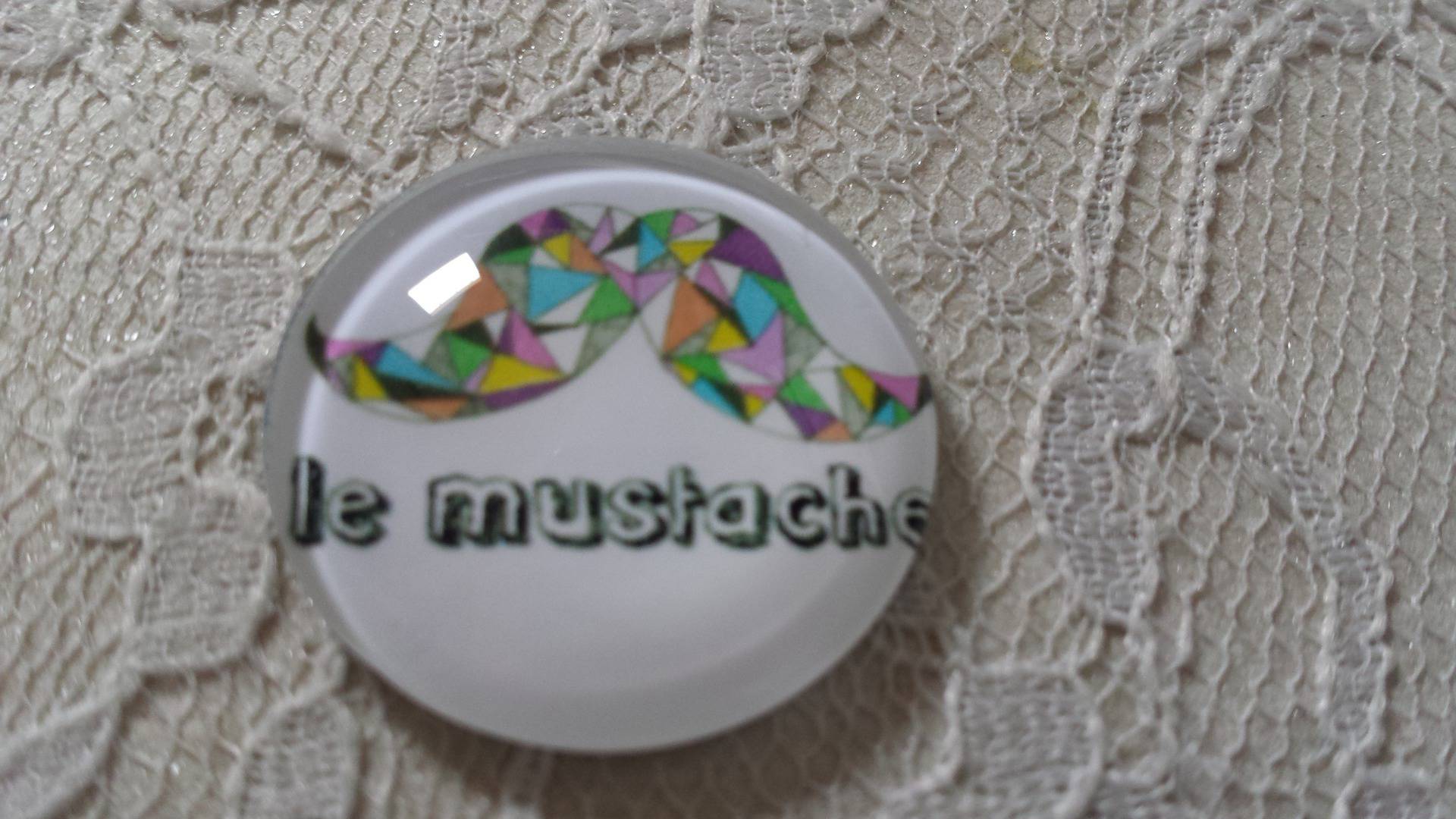 glazen cabochon rond 25mm snor 010 