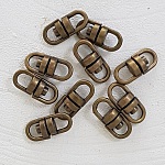 Roterende sleutelhangers Brons