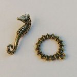Antiek gouden zeepaardje T-sluiting