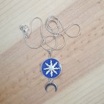 Collier pendentif enluminure soleil et lune argent