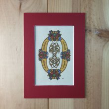 Verlichte letter O in Romaanse stijl