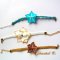 Turquoise kanten guipure armband en zijn beschilderde turquoise zijden bloem