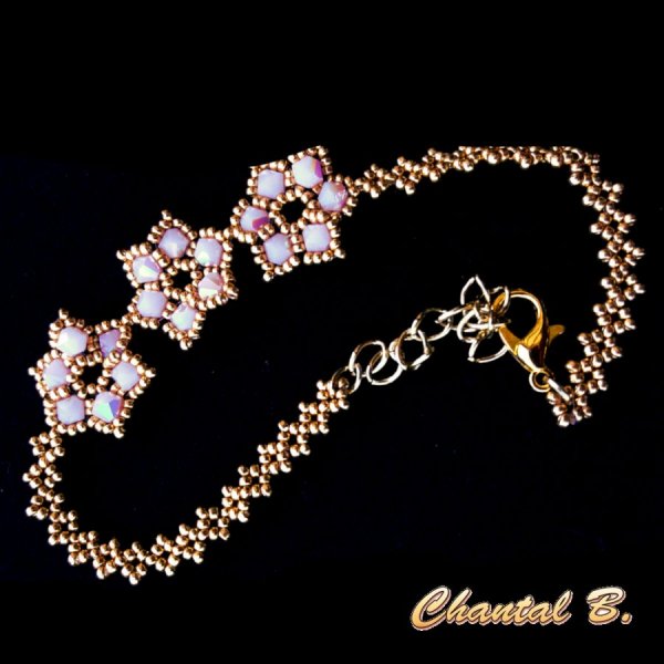 bruidsarmband met roze geweven parels en goud