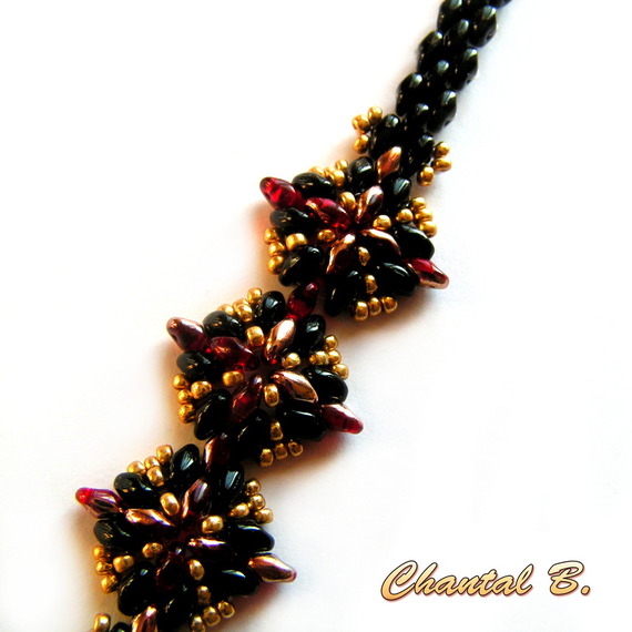 avond armband glazen kralen zwart rood en goud