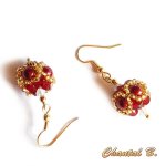 Oorbellen swarovski bolvorm bordeaux opaal en goud
