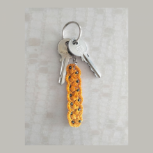 Verfijnde sleutelhanger "Gouden mosterd