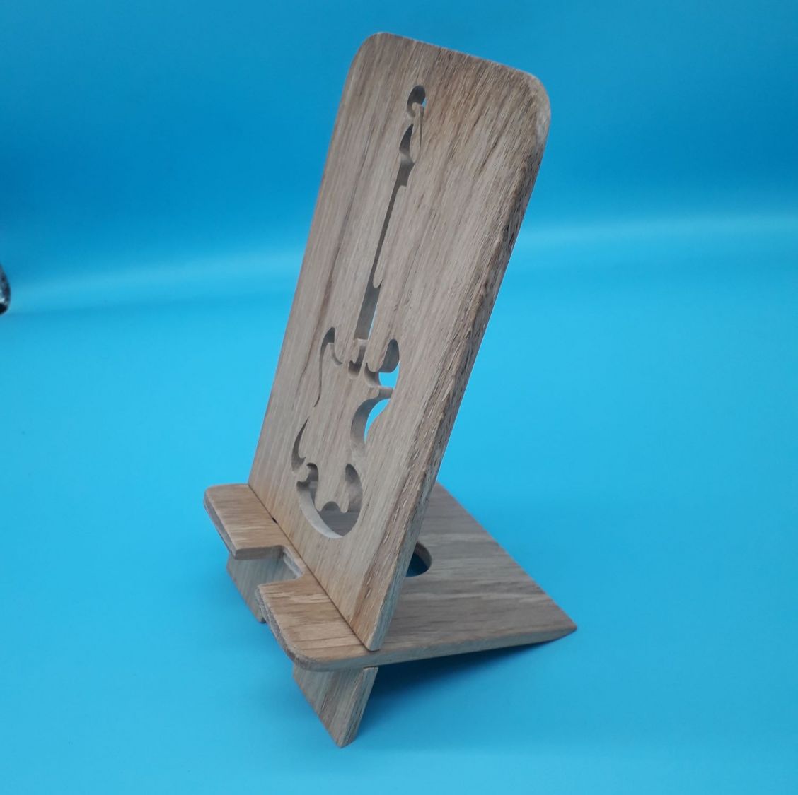 Verticale mobiele telefoonhouder met gitaarmotief