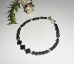 Originele armband bloemen en steentjes in hematiet met zilveren buisjes 925