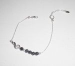Originele armband muzieknoot en hematietkralen aan 925 zilveren ketting