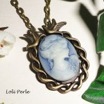 Blauwe cameo hanger met vogels in brons metaal aan ketting