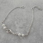 Gekweekte parelarmband met muzieknoot in zilver 925