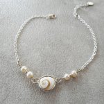 Gekweekte parel armband met St Lucia oog hart in zilver 925