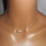 925 zilveren choker ketting met kleine vleugel en roze kristallen kralen
