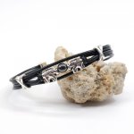 Olifantenarmband met steen op zwart lederen koorden 