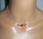Roze halsketting met rode gorgon aan 925 zilveren ketting