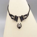 Zwarte micro-macramé ketting met labradoriet gezet