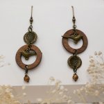 Houten oorbellen met messing vogels