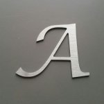 Geborstelde metalen letter LUCIDA CALLIGRAPHY