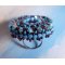Naïade ring geborduurd met een turquoise blauwe hars en kristal cabochon, een prachtig lichtspel.