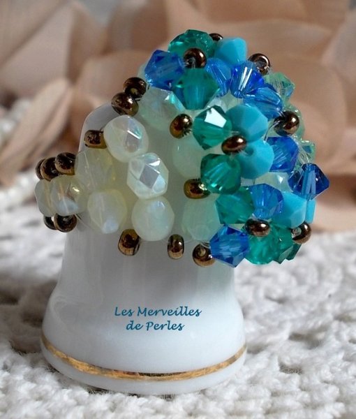 Aquamarijn ring met Swarovski kristal facetten en spinners