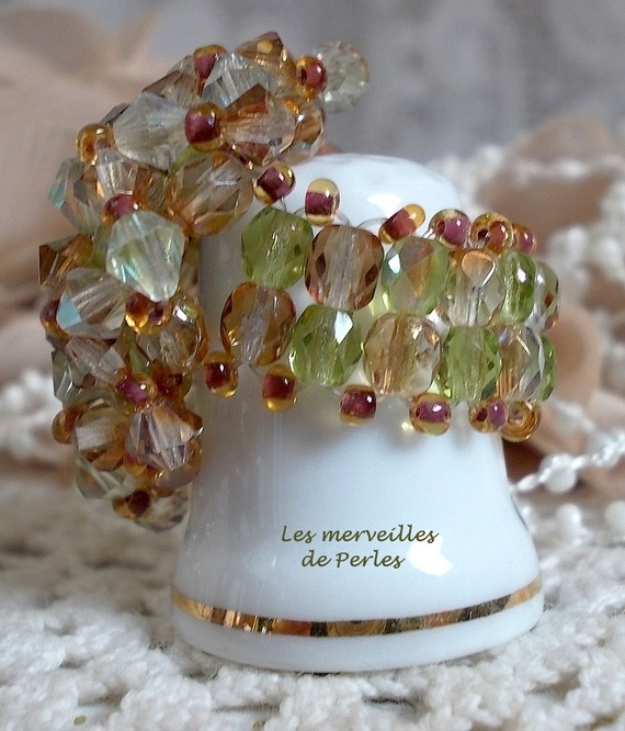 Veronese ring met facetten, draaiende toppen en een Swarovski kristallen shuttle