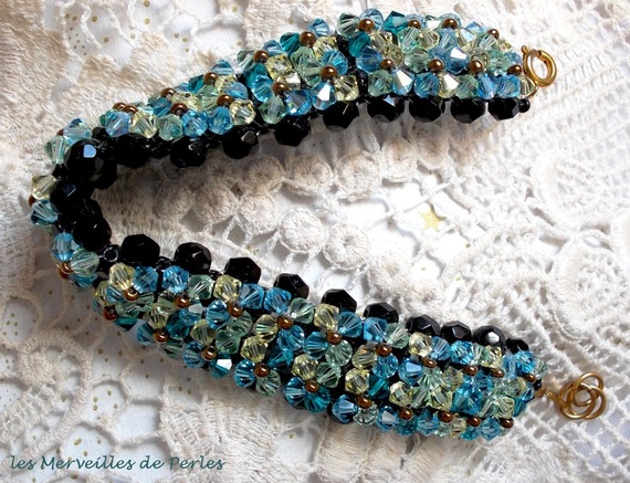 Fonkelende Aurora armband met zwarte facetten en gekleurde tollen in Swarovski kristal
