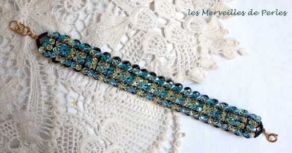 Fonkelende Aurora armband met zwarte facetten en gekleurde tollen in Swarovski kristal