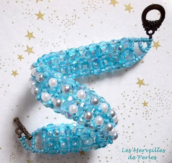 Hemelse kralen armband met facetten en parelmoer glazen kralen