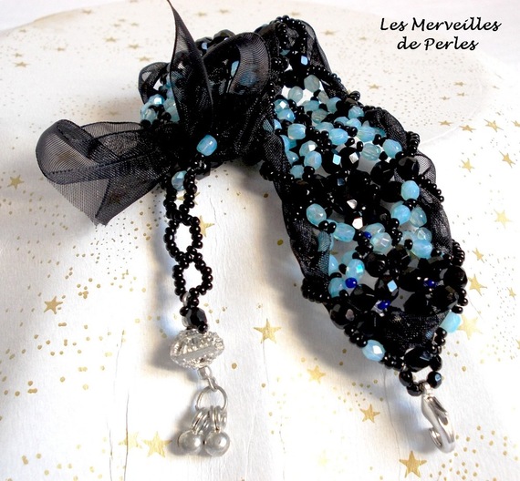 Prestige armband met zwarte en blauwe facetten en organza lint