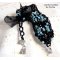 Prestige armband met zwarte en blauwe facetten en organza lint