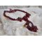 Rubby One ketting geborduurd met Swarovski kristallen en een keramische cabochon