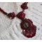 Rubby One ketting geborduurd met Swarovski kristallen en een keramische cabochon