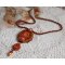 Lady in Orange hanger ketting is geborduurd met Swarovski kristallen, Miyuki rocailles en magic beads.