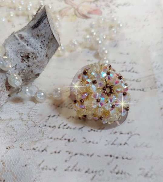 Aurora ring met facetten en draaiende toppen in Swarovski kristal