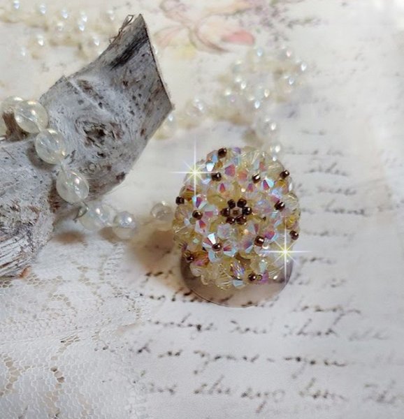 Aurora ring met facetten en draaiende toppen in Swarovski kristal