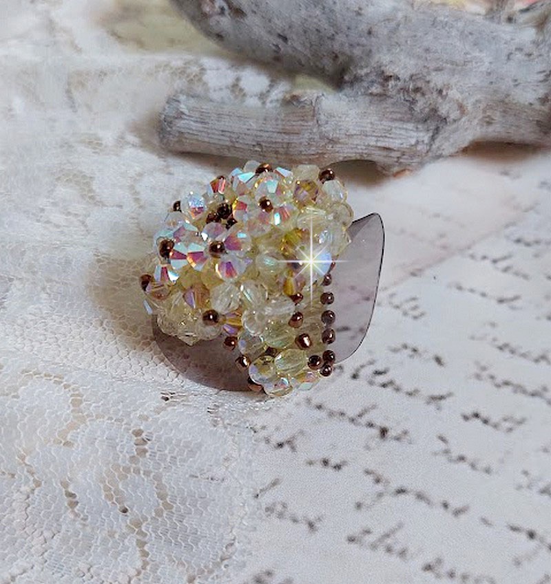 Aurora ring met facetten en draaiende toppen in Swarovski kristal