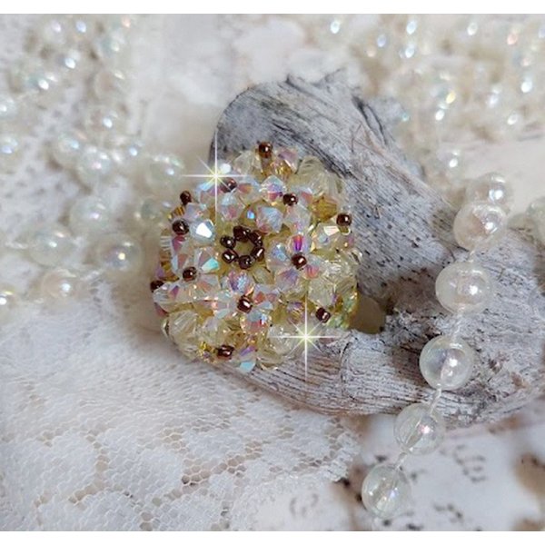 Aurora ring met facetten en draaiende toppen in Swarovski kristal