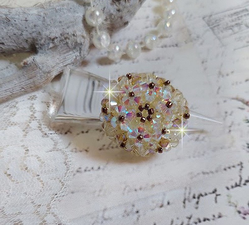 Aurora ring met facetten en draaiende toppen in Swarovski kristal
