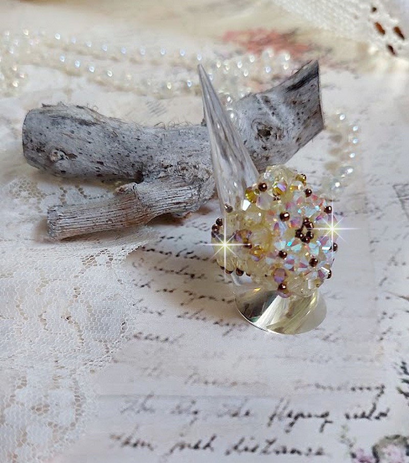 Aurora ring met facetten en draaiende toppen in Swarovski kristal